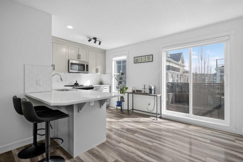 103 Cranbrook Walk Se, Calgary, AB - Indoor Photo Showing Kitchen With Upgraded Kitchen