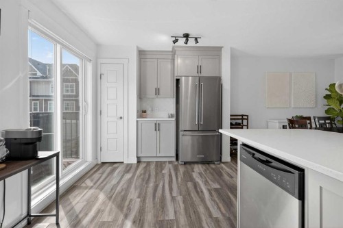103 Cranbrook Walk Se, Calgary, AB - Indoor Photo Showing Kitchen With Stainless Steel Kitchen