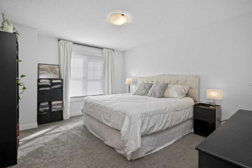 103 Cranbrook Walk Se, Calgary, AB - Indoor Photo Showing Bedroom