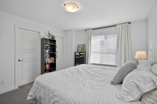103 Cranbrook Walk Se, Calgary, AB - Indoor Photo Showing Bedroom