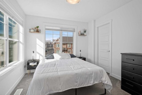 103 Cranbrook Walk Se, Calgary, AB - Indoor Photo Showing Bedroom