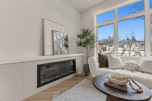 3107 42 Street Sw, Calgary, AB - Indoor Photo Showing Living Room With Fireplace