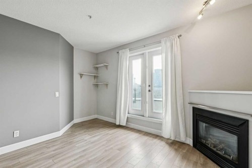 403-830 Centre Avenue Ne, Calgary, AB - Indoor With Fireplace