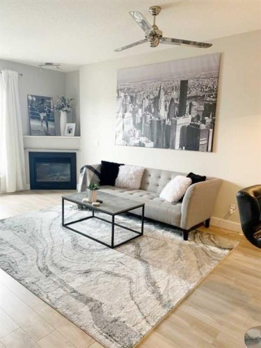 403-830 Centre Avenue Ne, Calgary, AB - Indoor Photo Showing Living Room With Fireplace