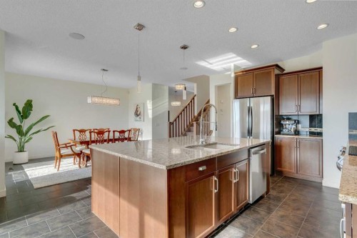 287 Sunset View, Cochrane, AB - Indoor Photo Showing Kitchen With Stainless Steel Kitchen With Upgraded Kitchen
