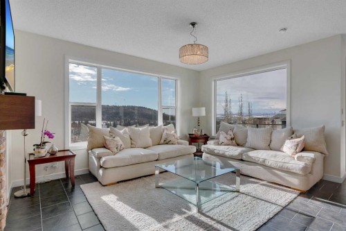 287 Sunset View, Cochrane, AB - Indoor Photo Showing Living Room