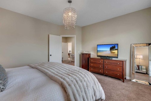 287 Sunset View, Cochrane, AB - Indoor Photo Showing Bedroom