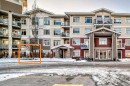 103-10 Auburn Bay Link Se, Calgary, AB  - Outdoor With Facade 