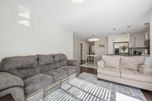 2413-11 Mahogany Row Se, Calgary, AB - Indoor Photo Showing Living Room