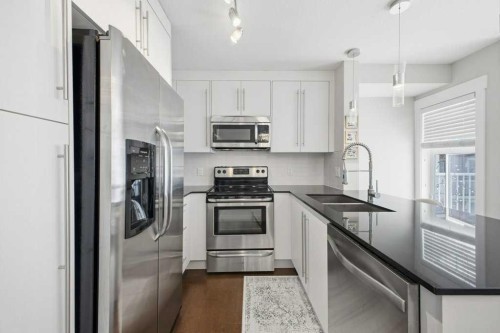 2413-11 Mahogany Row Se, Calgary, AB - Indoor Photo Showing Kitchen With Upgraded Kitchen