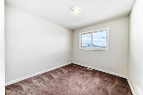 80 Magnolia Way Se, Calgary, AB - Indoor Photo Showing Other Room