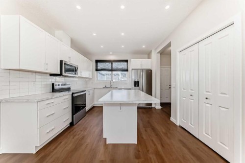80 Magnolia Way Se, Calgary, AB - Indoor Photo Showing Kitchen With Stainless Steel Kitchen With Upgraded Kitchen