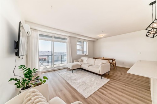 2307-55 Lucas Way Nw, Calgary, AB - Indoor Photo Showing Living Room