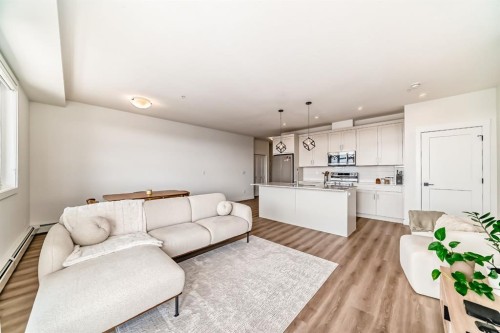 2307-55 Lucas Way Nw, Calgary, AB - Indoor Photo Showing Living Room