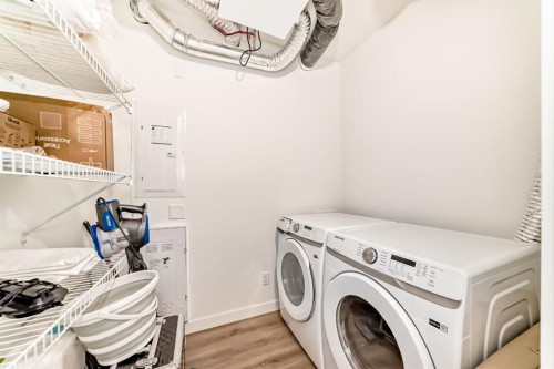 2307-55 Lucas Way Nw, Calgary, AB - Indoor Photo Showing Laundry Room