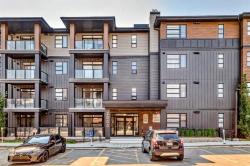 2307-55 Lucas Way Nw, Calgary, AB - Outdoor With Balcony With Facade