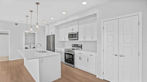 1302-220 Seton Grove Se, Calgary, AB - Indoor Photo Showing Kitchen With Upgraded Kitchen