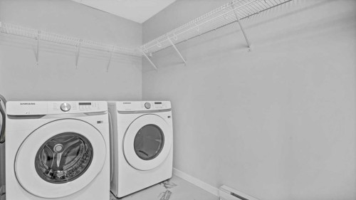 1302-220 Seton Grove Se, Calgary, AB - Indoor Photo Showing Laundry Room