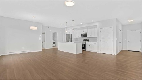 1302-220 Seton Grove Se, Calgary, AB - Indoor Photo Showing Kitchen With Upgraded Kitchen
