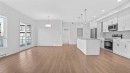 1302-220 Seton Grove Se, Calgary, AB  - Indoor Photo Showing Kitchen With Upgraded Kitchen 