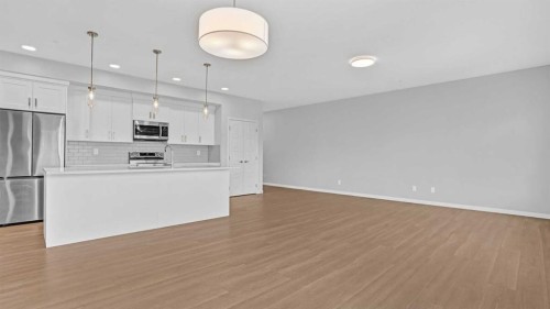 1302-220 Seton Grove Se, Calgary, AB - Indoor Photo Showing Kitchen With Upgraded Kitchen