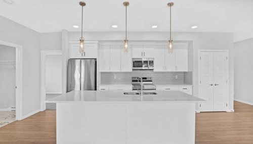 1302-220 Seton Grove Se, Calgary, AB - Indoor Photo Showing Kitchen With Upgraded Kitchen