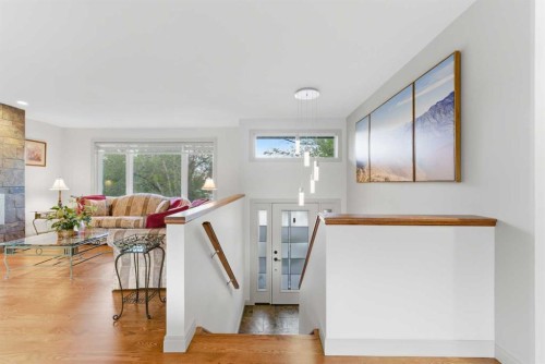 228 Cantrell Place Sw, Calgary, AB - Indoor With Fireplace