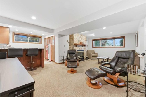 228 Cantrell Place Sw, Calgary, AB - Indoor With Fireplace