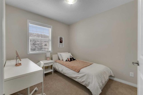 1002-1001 8 Street Nw, Airdrie, AB - Indoor Photo Showing Bedroom