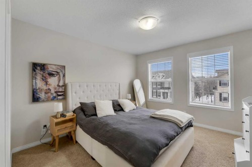 1002-1001 8 Street Nw, Airdrie, AB - Indoor Photo Showing Bedroom