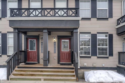 1002-1001 8 Street Nw, Airdrie, AB - Outdoor With Deck Patio Veranda With Facade