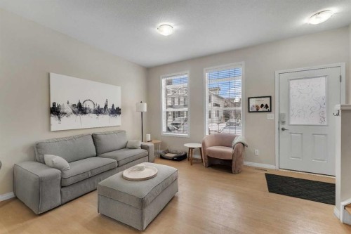 1002-1001 8 Street Nw, Airdrie, AB - Indoor Photo Showing Living Room