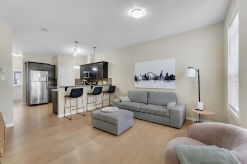 1002-1001 8 Street Nw, Airdrie, AB - Indoor Photo Showing Living Room