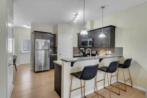 1002-1001 8 Street Nw, Airdrie, AB - Indoor Photo Showing Kitchen With Stainless Steel Kitchen With Upgraded Kitchen