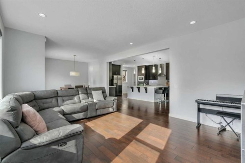 151 Stonemere Green, Chestermere, AB - Indoor Photo Showing Living Room