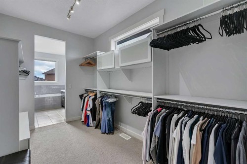 151 Stonemere Green, Chestermere, AB - Indoor With Storage