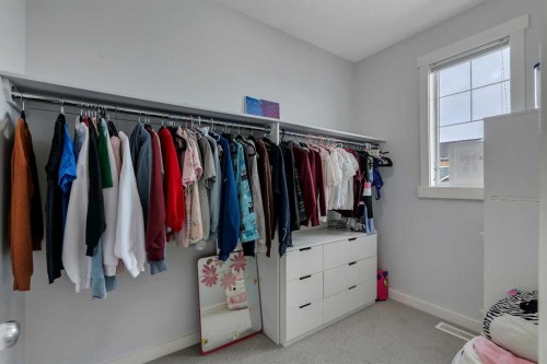 151 Stonemere Green, Chestermere, AB - Indoor With Storage