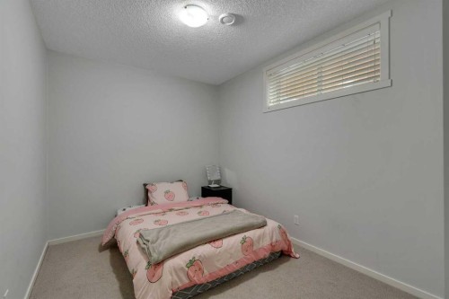 151 Stonemere Green, Chestermere, AB - Indoor Photo Showing Bedroom