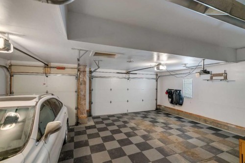 151 Stonemere Green, Chestermere, AB - Indoor Photo Showing Garage