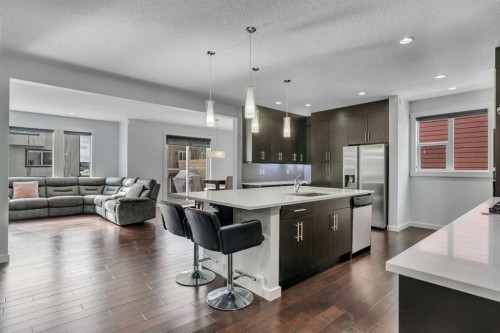 151 Stonemere Green, Chestermere, AB - Indoor Photo Showing Kitchen With Stainless Steel Kitchen