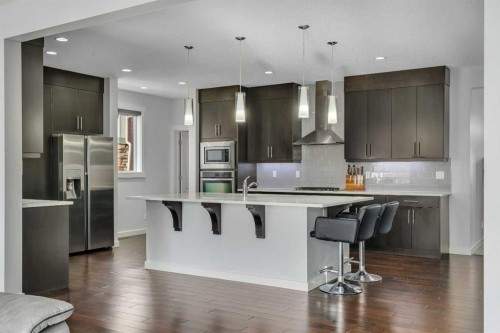 151 Stonemere Green, Chestermere, AB - Indoor Photo Showing Kitchen With Stainless Steel Kitchen With Upgraded Kitchen