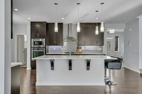 151 Stonemere Green, Chestermere, AB - Indoor Photo Showing Kitchen With Upgraded Kitchen