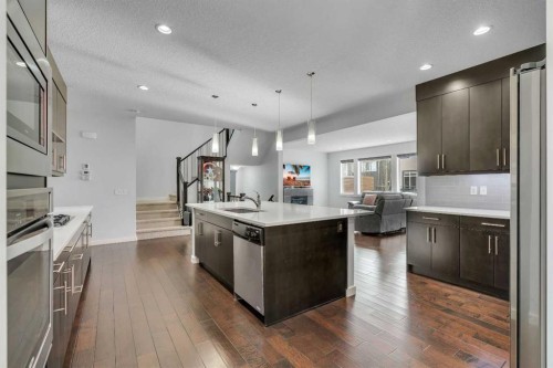 151 Stonemere Green, Chestermere, AB - Indoor Photo Showing Kitchen With Stainless Steel Kitchen With Upgraded Kitchen