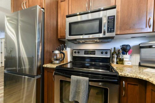 102-6315 Ranchview Drive Nw, Calgary, AB - Indoor Photo Showing Kitchen With Stainless Steel Kitchen