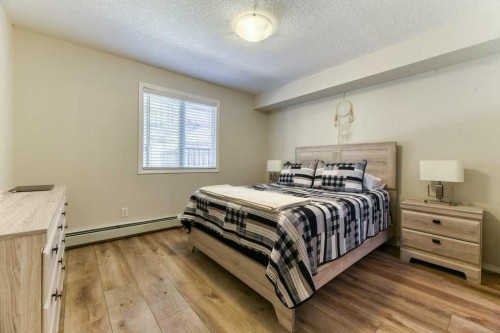 102-6315 Ranchview Drive Nw, Calgary, AB - Indoor Photo Showing Bedroom