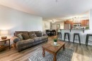 102-6315 Ranchview Drive Nw, Calgary, AB  - Indoor Photo Showing Living Room 