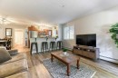 102-6315 Ranchview Drive Nw, Calgary, AB  - Indoor Photo Showing Living Room 