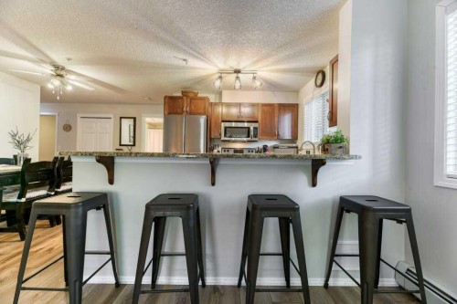 102-6315 Ranchview Drive Nw, Calgary, AB - Indoor Photo Showing Kitchen