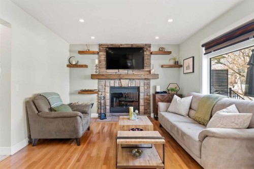 49 Macewan Ridge Close Nw, Calgary, AB - Indoor Photo Showing Living Room With Fireplace