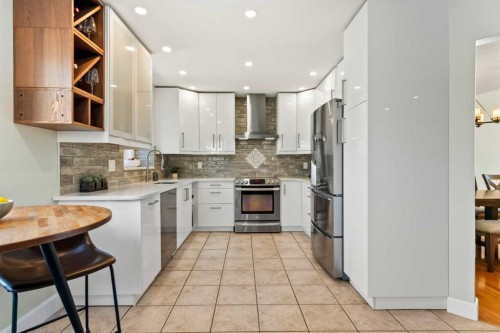 49 Macewan Ridge Close Nw, Calgary, AB - Indoor Photo Showing Kitchen With Stainless Steel Kitchen With Upgraded Kitchen